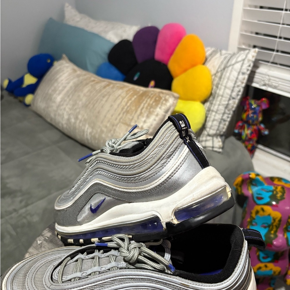 Nike Metallic Silver Sneakers with Black and Blue Accents